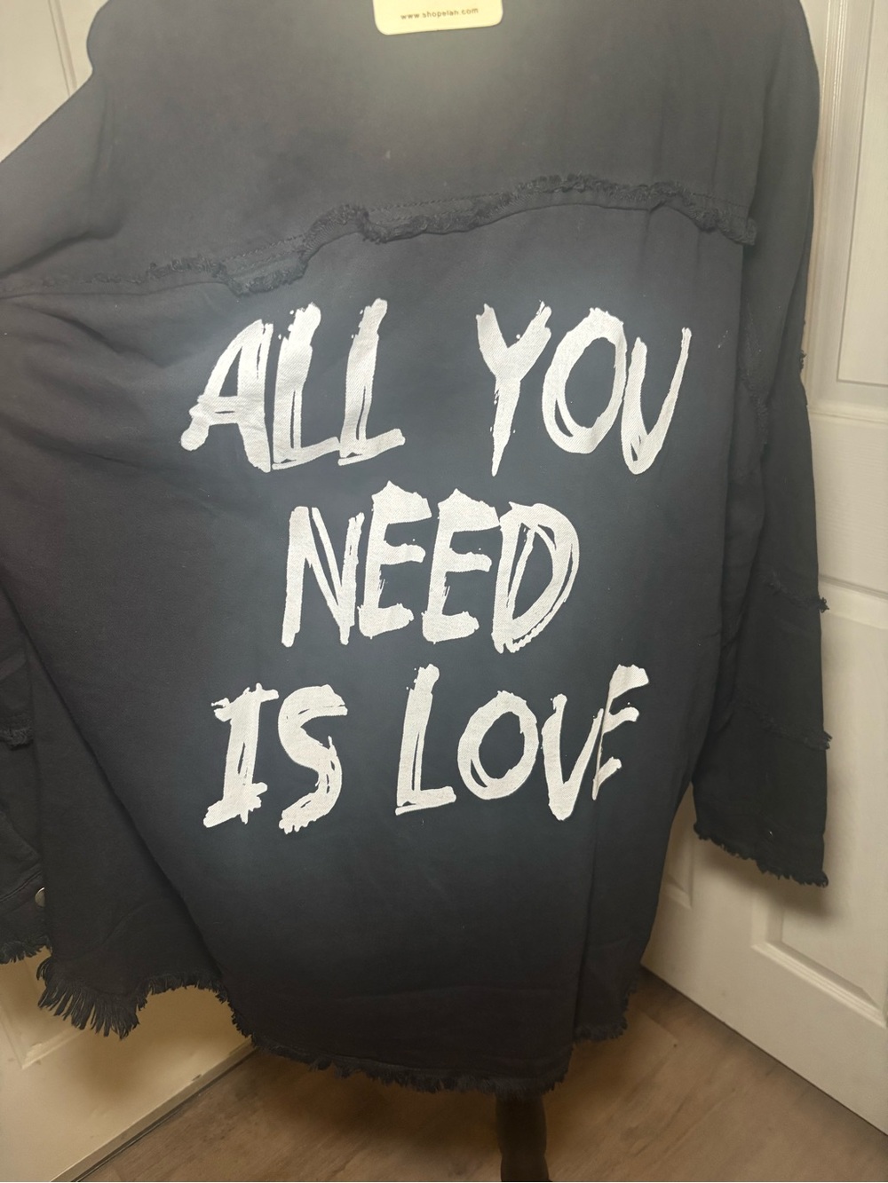 Elan Black Jean Jacket with White 'All You Need Is Love' Graphic